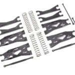 Aluminum RC car suspension arm and shock absorber upgrade parts for off-road racing.