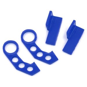 Blue RC car bumper spacers and brackets for RC car suspension upgrade.