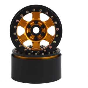 High-performance RC car wheel with colorful accents for off-road racing.