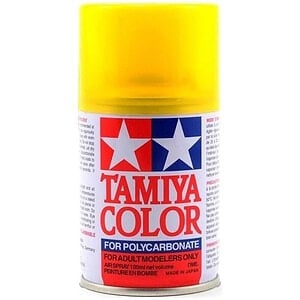 Vibrant yellow Tamiya spray paint for RC car customization and model building.