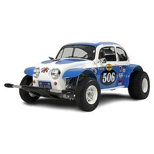 Remote control off-road race car with blue and white body and large tires.
