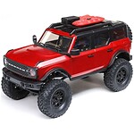 RC off-road vehicle, red scale model for RC car enthusiasts and hobbyists. Red RC car with rugged tires and detailed design, perfect for remote control car fans and off-road racing.