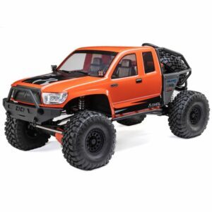 Off-road RC truck with large tires and rugged design for remote control racing and crawling.