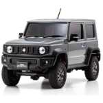 High-performance RC off-road vehicle with rugged design and durable tires.