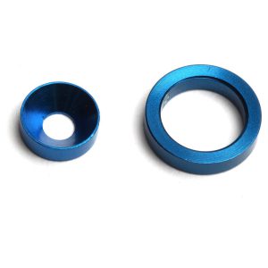 Blue RC car shock spacers, aluminum upgrade parts for remote control cars, enhancing suspension and handling.