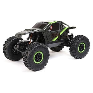 Remote control off-road car with large tires and durable body for rugged terrain. Perfect for hobbyists and RC enthusiasts.