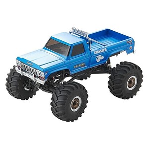 Bright blue monster RC truck with oversized tires for off-road racing.