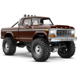 Detailed image of a rugged RC off-road truck with large tires and lifted suspension. Perfect for RC car enthusiasts and off-road racing fans.