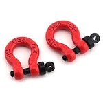 Bright red RC car shackles with black mounting eyelets for off-road racing parts.