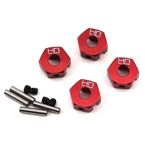 Durable red aluminum RC car wheel hexes with mounting hardware for RC racing and off-road use.