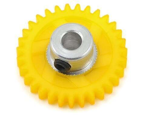 Durable yellow plastic gear wheel with metal center for remote control cars.