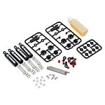 RC car repair parts kit with shock absorbers, screws, and lubrication oil.