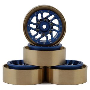 Blue anodized RC car wheels with gold foam tires for off-road racing.
