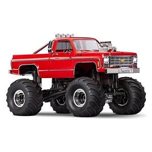 Highly detailed remote control monster truck with oversized tires and powerful engine.