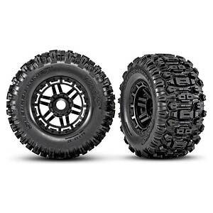 Durable rubber tires for RC off-road vehicles with aggressive tread design for maximum grip.