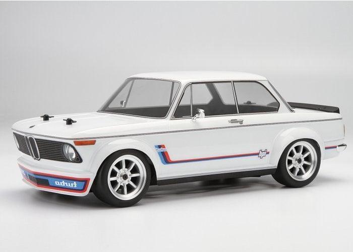 Detailed scale model of vintage RC car for enthusiasts.