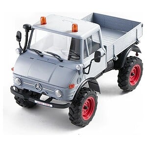 Remote control off-road RC truck with realistic details and large tires for outdoor racing.