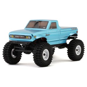 Remote control off-road monster truck with large tires, blue body, and rugged design for outdoor racing.
