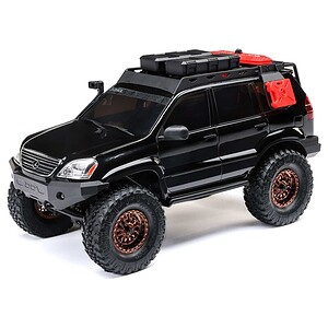 Detailed black RC off-road SUV with rugged tires, roof cargo, and versatile design for RC car enthusiasts.
