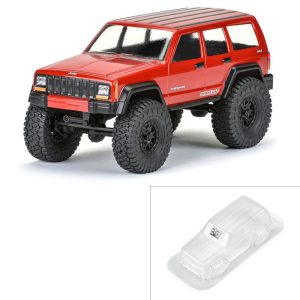 Detail-rich RC off-road Jeep with large tires and rugged design.