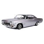 Classic silver vintage RC car with detailed design and chrome accents.