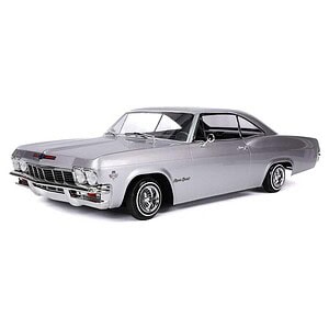 Classic silver vintage RC car with detailed design and chrome accents.