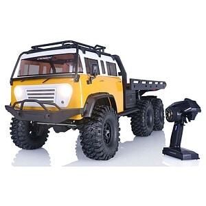 Remote-controlled toy truck with large tires and rugged design for outdoor racing.