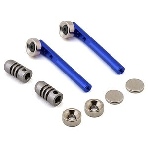 Lightweight blue aluminum RC car suspension arms and metal shock spacers for high performance.