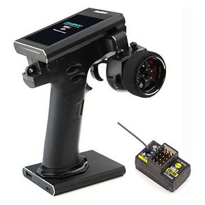 Remote control transmitter and receiver for RC cars with LCD screen, suitable for hobby enthusiasts.