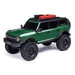 Detailed image of a green off-road RC car with large tires and rugged design, perfect for outdoor racing enthusiasts.