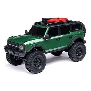 Detailed image of a green off-road RC car with large tires and rugged design, perfect for outdoor racing enthusiasts.