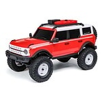 Detailed image of a red and white remote control off-road SUV with large tires, perfect for RC car enthusiasts.