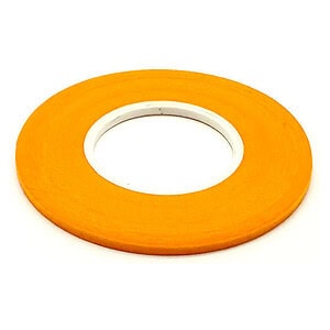 Bright orange RC car tape wheel on white background, replacement part for hobby racing.