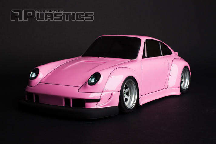 Bright pink RC car Porsche body with realistic details for hobbyists and racers.