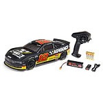 Remote control RC car with detailed decals, batteries, charger, and racing accessories for RC hobbyists.