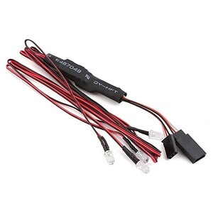 Versatile RC car wiring harness with LED lights, connectors, and wires for advanced remote control vehicles.