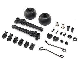 Miniature RC car parts for maintenance and upgrades, including wheels, screws, and suspension components.
