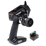 Remote control RC car transmitter with digital display and steering wheel.